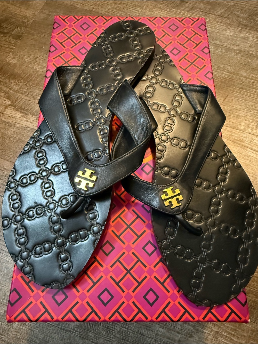 Tory Burch Black Leather Embossed Logo Thong Sandals with Gold Emblem